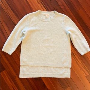 Side-slit frosty blue girl’s sweater